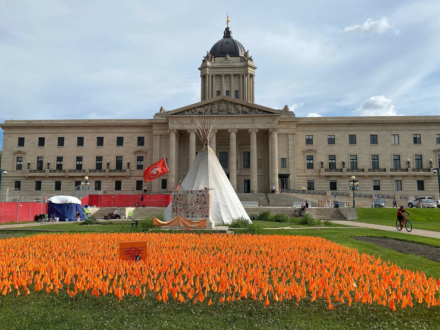 Eviction warnings handed to longtime Manitoba legislature encampments